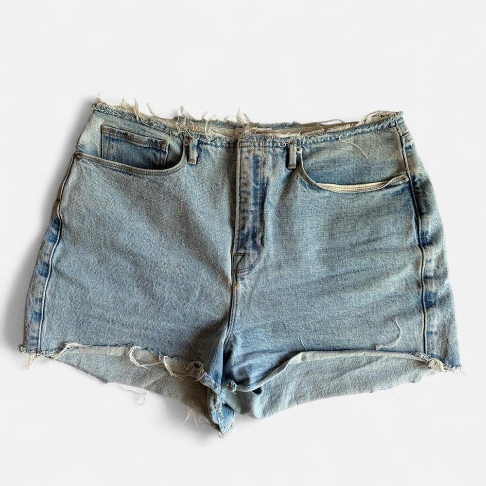 Good American Light Blue High-Rise Distressed Denim Shorts
